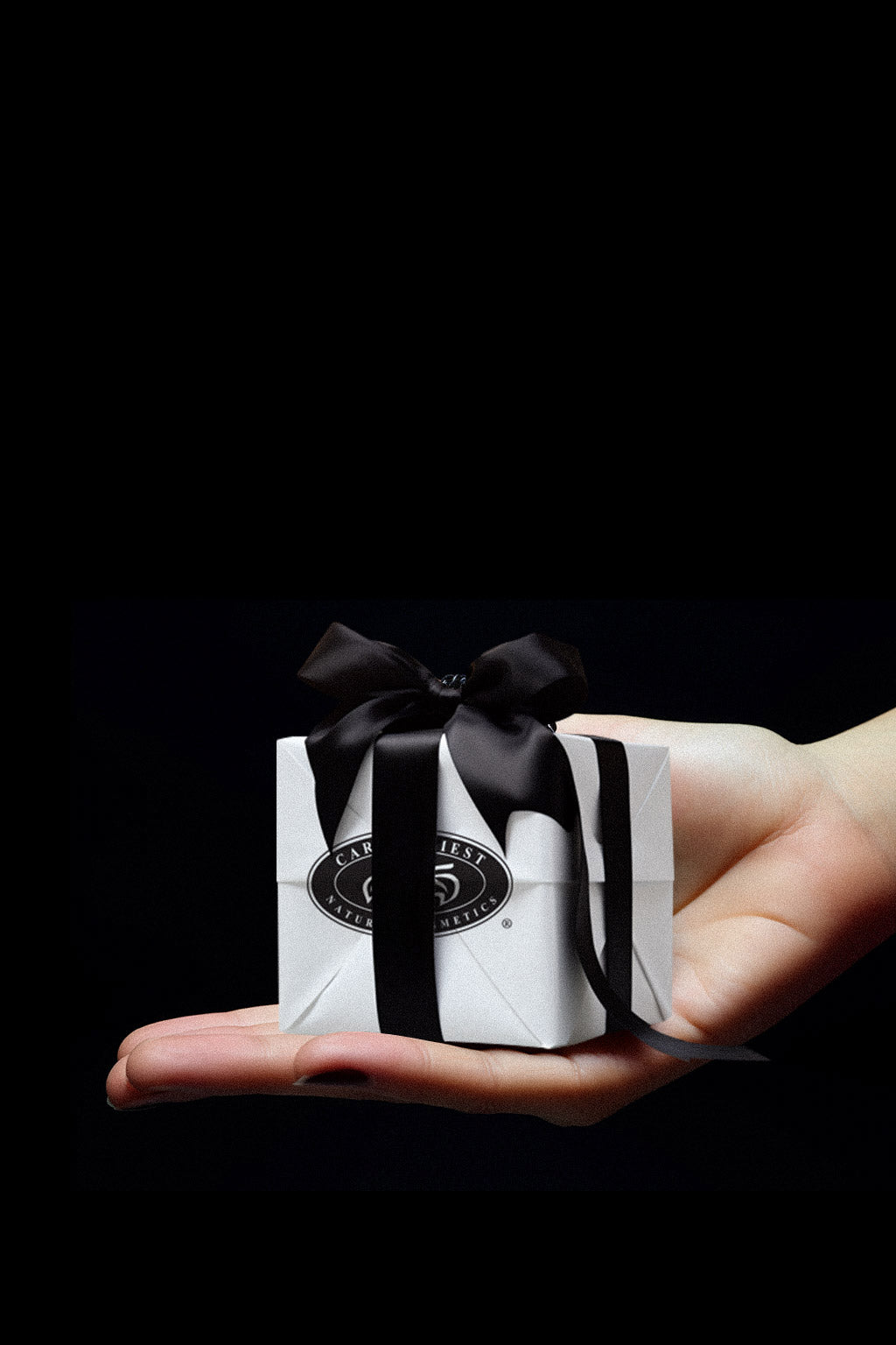 Carol Priest showcasing a natural and organic gift box made from premium ingredients.